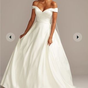 Size 18 David’s bridal wedding dress. Not altered and comes with a belt.